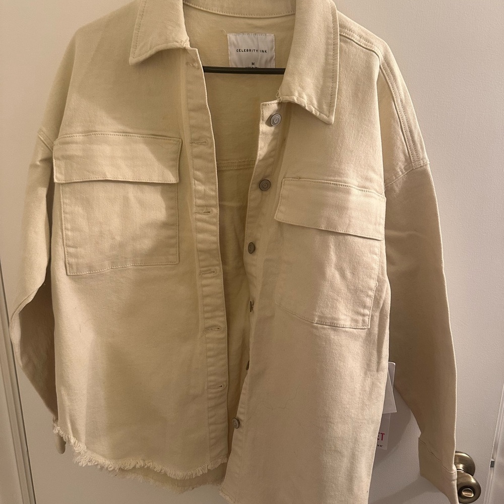 Celebrity Pink Cream Jacket Label Detail